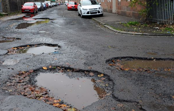 Pot holes in a road